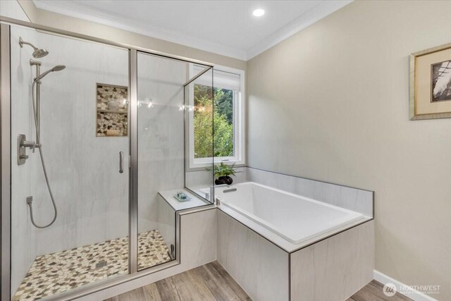 19017 5th St E, Lake Tapps, WA 98391 - full bath featuring a shower stall, crown molding, a bath, and wood finished floors