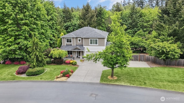 19017 5th St E, Lake Tapps, WA 98391 - view of front of property with driveway, covered porch, a garage, and a shingled roof