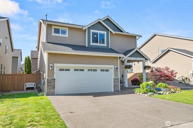 view of front facade featuring an attached garage, stone siding, and concrete driveway