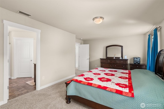carpeted bedroom with baseboards