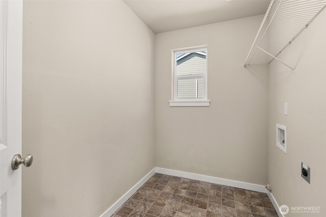 laundry room featuring baseboards, hookup for a washing machine, hookup for an electric dryer, and stone finish flooring
