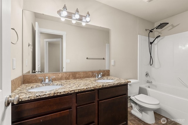 full bathroom with toilet, double vanity, bathing tub / shower combination, and tile patterned flooring