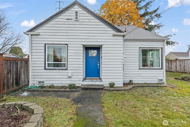 1921 N Stevens St, Tacoma, WA 98406 - bungalow with a shingled roof, a fenced backyard, and a front lawn