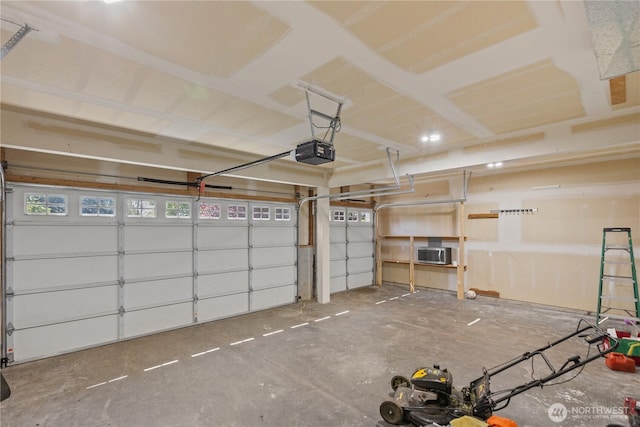 garage with a garage door opener and cooling unit