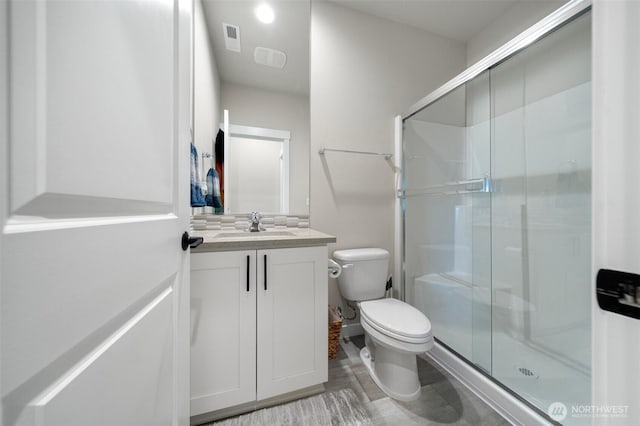 8852 N 5th St, Ridgefield, WA 98642 - full bath with vanity, toilet, visible vents, and a shower stall