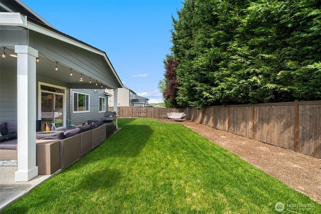 8852 N 5th St, Ridgefield, WA 98642 - view of yard featuring a fenced backyard and outdoor lounge area