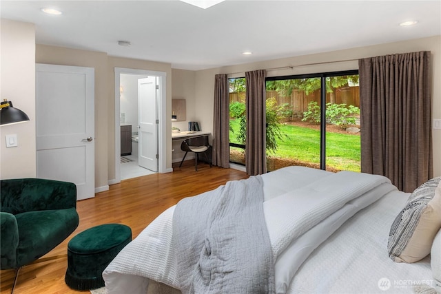 8864 SE 60th St, Mercer Island, WA 98040 - bedroom with wood finished floors, recessed lighting, ensuite bathroom, and baseboards