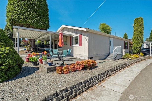 23825 15th Ave SE Unit 180, Bothell, WA 98021 - rear view of property featuring crawl space and a patio area