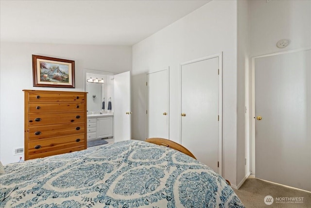 23825 15th Ave SE Unit 180, Bothell, WA 98021 - carpeted bedroom with vaulted ceiling and ensuite bathroom