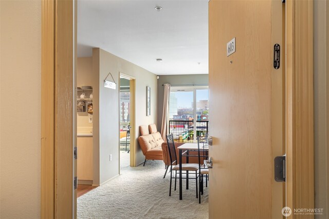 hall with carpet floors