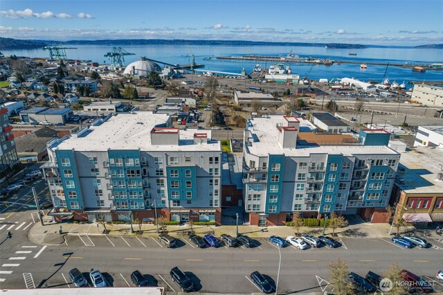 bird's eye view with a water view