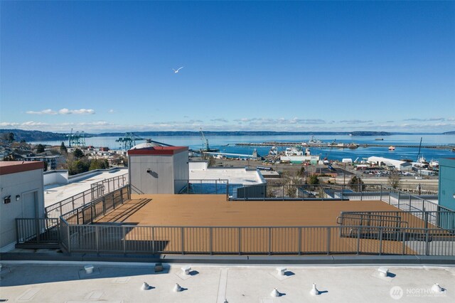 exterior space with a water view