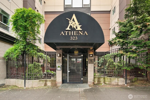 323 Queen Anne Ave N Unit 508, Seattle, WA 98109 - property entrance featuring fence and a gate