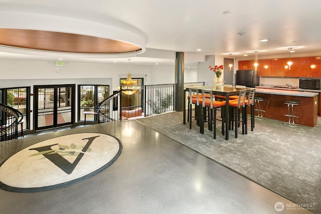 323 Queen Anne Ave N Unit 508, Seattle, WA 98109 - dining area with recessed lighting and finished concrete flooring