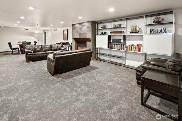 323 Queen Anne Ave N Unit 508, Seattle, WA 98109 - living area with recessed lighting, carpet, baseboards, and a fireplace