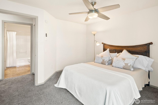 323 Queen Anne Ave N Unit 508, Seattle, WA 98109 - carpeted bedroom featuring baseboards and a ceiling fan