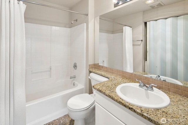 323 Queen Anne Ave N Unit 508, Seattle, WA 98109 - bathroom featuring shower / bath combo with shower curtain, toilet, and vanity