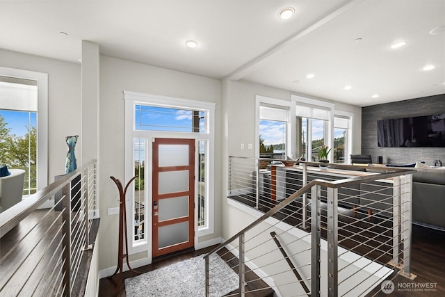 entrance foyer featuring recessed lighting, baseboards, and wood finished floors