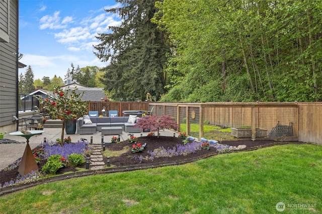 view of yard with a fenced backyard, a patio, and an outdoor living space