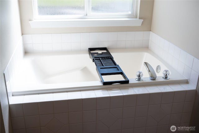 full bath with a bath