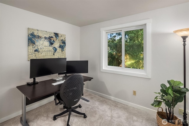 office area with baseboards and carpet floors