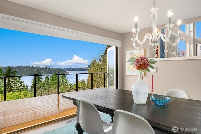 5340 W Mercer Way, Mercer Island, WA 98040 - dining room with a chandelier and a water view