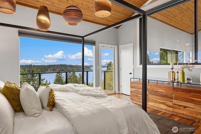 5340 W Mercer Way, Mercer Island, WA 98040 - bedroom featuring a water view, wood finished floors, wooden ceiling, multiple windows, and vaulted ceiling