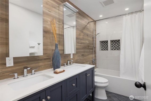 5340 W Mercer Way, Mercer Island, WA 98040 - full bath with shower / tub combo, toilet, double vanity, backsplash, and recessed lighting