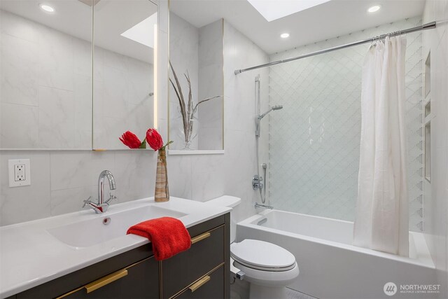 5340 W Mercer Way, Mercer Island, WA 98040 - full bathroom with shower / tub combo with curtain, recessed lighting, vanity, toilet, and a skylight
