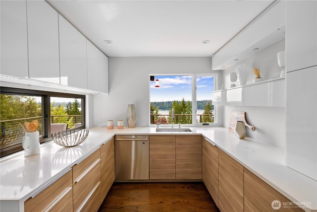 5340 W Mercer Way, Mercer Island, WA 98040 - kitchen with stainless steel dishwasher, a sink, modern cabinets, and light countertops