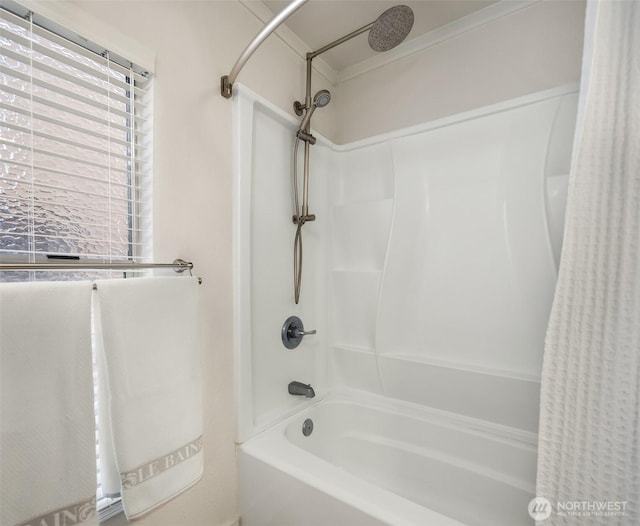 bathroom featuring shower / bathtub combination with curtain