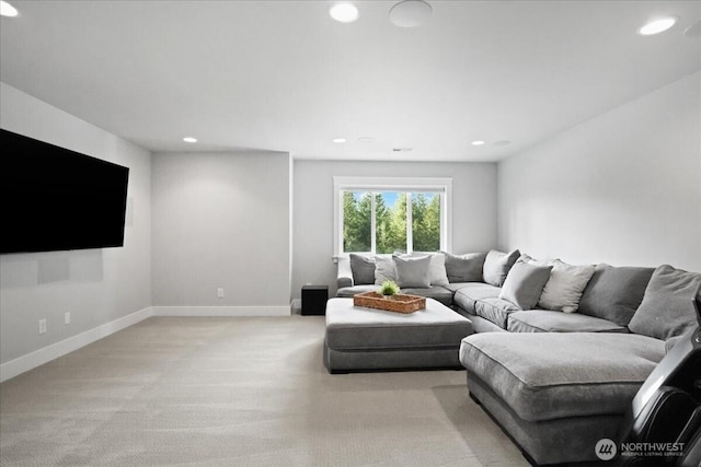 living room with light colored carpet, baseboards, and recessed lighting