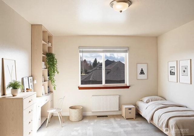 1509 Seahawk Dr, Ferndale, WA 98248 - bedroom with baseboards, light carpet, and radiator
