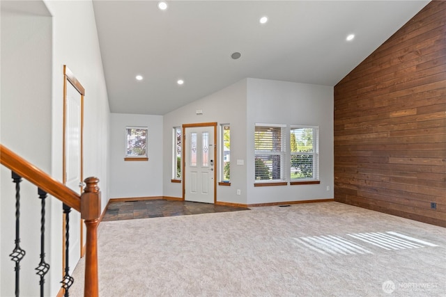 1509 Seahawk Dr, Ferndale, WA 98248 - entrance foyer with wooden walls, high vaulted ceiling, carpet, and recessed lighting