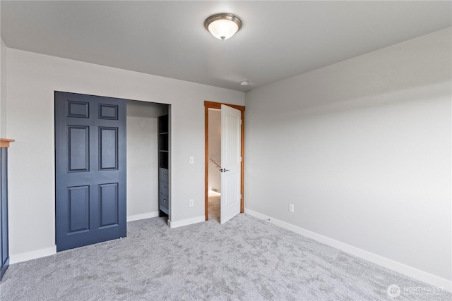 1509 Seahawk Dr, Ferndale, WA 98248 - unfurnished bedroom featuring baseboards, carpet, and a closet