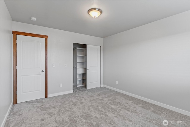 1509 Seahawk Dr, Ferndale, WA 98248 - unfurnished bedroom featuring carpet floors, baseboards, and a closet