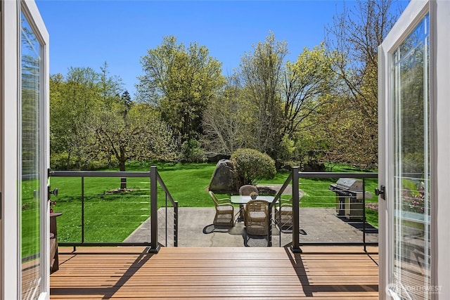 10117 NE Kitsap St, Bainbridge Island, WA 98110 - wooden terrace with a yard and a grill