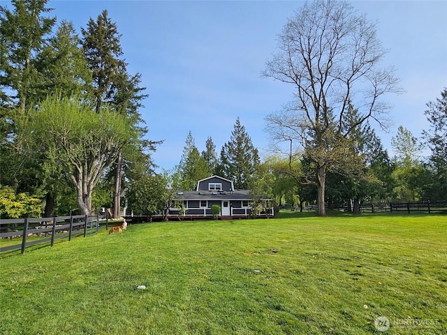 view of yard featuring fence