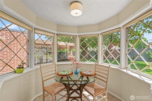 1423 Springwater Ave, Wenatchee, WA 98801 - sunroom / solarium featuring baseboards