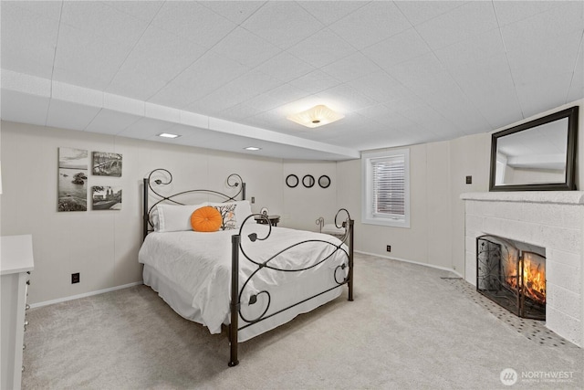 1423 Springwater Ave, Wenatchee, WA 98801 - bedroom with light carpet, a fireplace, and baseboards