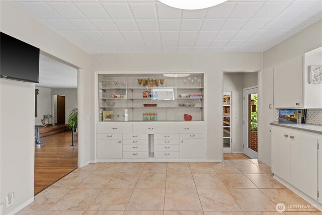 1423 Springwater Ave, Wenatchee, WA 98801 - unfurnished dining area featuring built in features and light tile patterned flooring