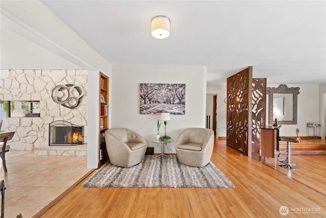 1423 Springwater Ave, Wenatchee, WA 98801 - sitting room with a stone fireplace, wood finished floors, and built in features