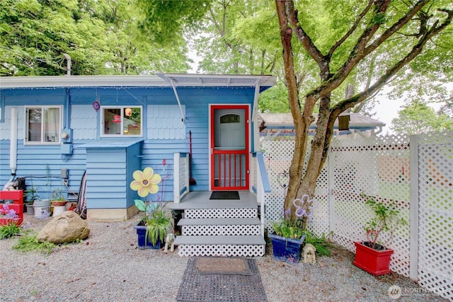 view of front of home with fence
