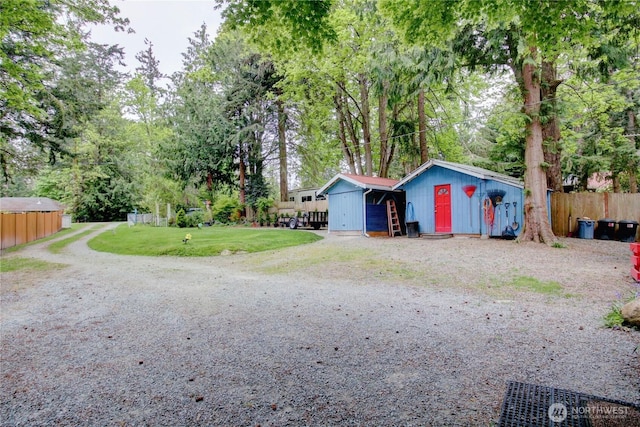 garage featuring fence