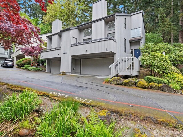 view of building exterior featuring an attached garage
