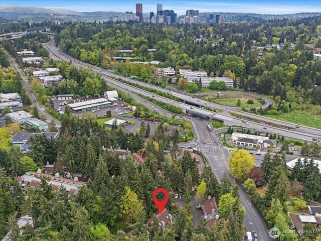 birds eye view of property featuring a view of city