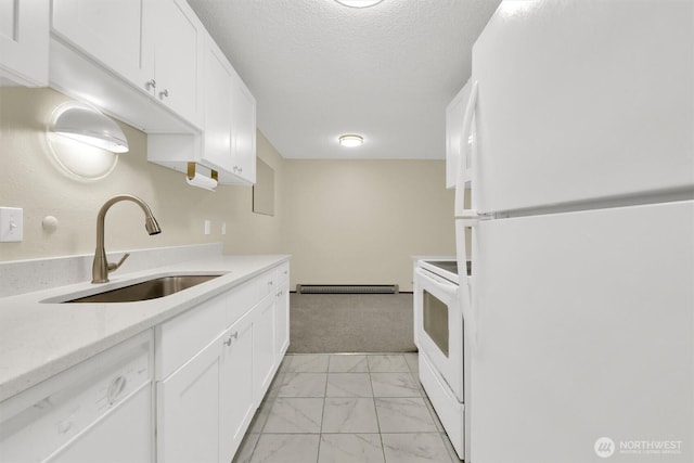kitchen featuring a sink, white cabinets, white appliances, and marble finish floor