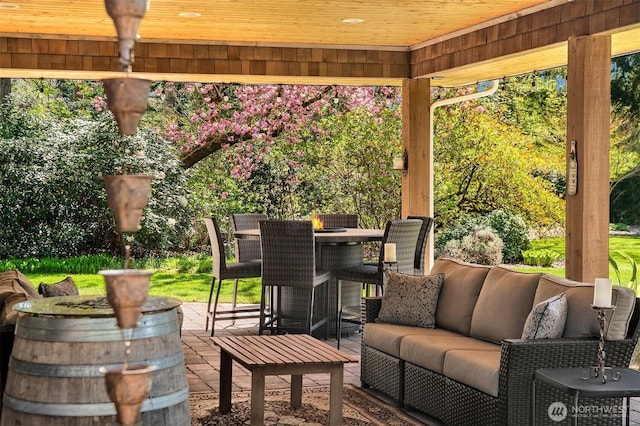 view of patio / terrace with an outdoor hangout area and outdoor dining area
