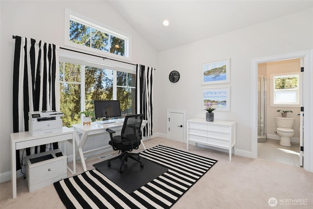 office with carpet floors, high vaulted ceiling, visible vents, and baseboards