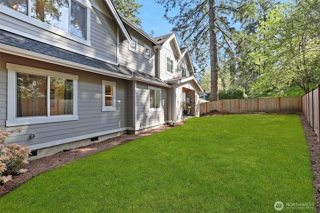 view of yard featuring a fenced backyard